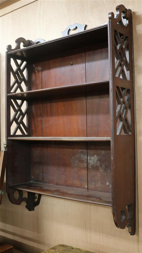 A pair of Georgian style mahogany hanging wall shelves, W.61cm